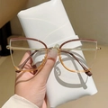 Brown cat-eye anti-blue light glasses with gold metal temples and gradient frame - Brown to Transparent Tea Gold Frame