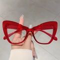 Handheld vintage transparent red cat-eye glasses frame with oversized fashion design - Transparent Red Frame Clear Lens