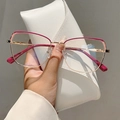 Montatura per occhiali poligonale in metallo oro rosa con dettagli sopracciglia magenta - Montatura Oro Rosso Rosa Lente Trasparente