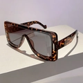 Detail of tortoise shell oversized flat top sunglasses with silver metal accents on the frame - Leopard Frame Grey Lens