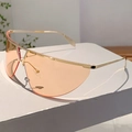 Lunettes de soleil de sport oversize avec verres orange et monture dorée - Monture Dorée Verre Thé Clair