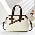 Elegant beige and brown shell-shaped crossbody bag with lychee grain and silver chain - Off-white