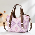 Chic purple geometric fabric handbag with brown leather straps and gold-toned hardware - Purple