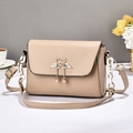 Beige faux leather crossbody bag with swan pearl clasp and acrylic chain strap - Swan Pearl Buckle / Khaki