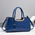 Elegant navy blue crocodile pattern handbag with gold hardware and shoulder strap - Blue