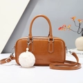 Brown faux leather Boston handbag with plush charm and adjustable strap for women - Khaki/Earth Yellow