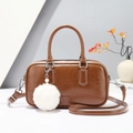 Retro Boston handbag in dark brown faux leather with plush ball charm and strap - Brown