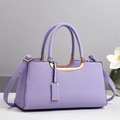 Lavender purple lychee leather handbag for women with gold hardware and shoulder strap - Purple