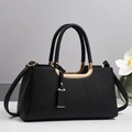 Elegant black lychee grain leather handbag with gold hardware and shoulder strap - Black