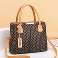 Women's brown monogram tote bag with leather handles and gold metal pendant - Apricot