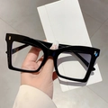 Detail of chunky black square frame glasses showing sturdy metal hinge and sleek finish - Black Frame Clear Lens