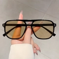 Vintage square sunglasses with black frame, tea lenses, and silver double rivet details - Black Frame Champagne Lens