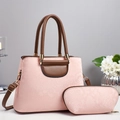 Detail of pink and brown patchwork tote bag set with textured leather and gold hardware - Pink