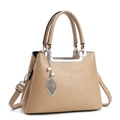 Minimalist khaki large capacity leather handbag with pebble texture and leaf pendant - Khaki