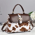 Women's vintage square bag with brown cow print and golden metallic buckle - Khaki