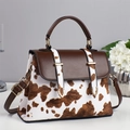 Stylish cow print crossbody handbag with brown leather accents and gold hardware decoration - Khaki