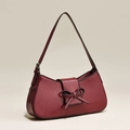 Bolso vintage francés de piel charol rojo oscuro con lazo decorativo y correa fina - Granate