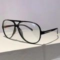 Detalle de montura aviador de carey con toques metálicos sobre soporte blanco sólido - Montura Negra Lente Transparente