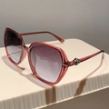 Occhiali da sole oversize bordeaux da donna con lenti sfumate e dettaglio rosa - Montatura Rosso Vino Lenti Doppie Grigie