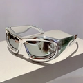 Futuristic silver Y2K bubble sunglasses with streamlined metallic frames on a white stand - Electroplated Silver