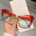 Occhiali cat-eye con montatura trasparente sfumata rosso e blu dal design moderno - Montatura Sfumata Arancione Blu Lente Trasparente