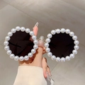 Chic round frame sunglasses with large white pearl trim and dark lenses for parties - Gold Frame Grey Lens