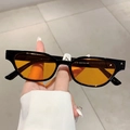 Classic retro cat eye sunglasses with thick black frames and orange tinted lenses - Black Frame Yellow Lens