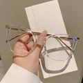 Montatura trasparente per occhiali cat-eye minimalista con stanghette in metallo dorato - Montatura Trasparente