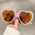 Modische herzförmige Sonnenbrille mit rosa Rahmen und orange verspiegelten Gläsern - Gelee Purpurner Rahmen Rote Folie