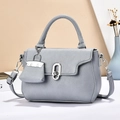 Vintage gray pebbled leather handbag with silver twist lock and mini pendant charm - Blue