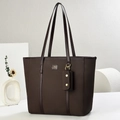Detail of dark brown woven tote bag with metallic logo and detachable small pouch - Coffee