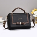 Chic black and brown leather crossbody bag with bow detail and gold hardware - Black