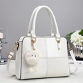 Chic white crossbody bag with crocodile pattern panels and a plush doll charm - White