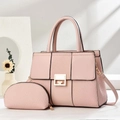 Detail of light pink shoulder bag set with woven texture and gold metal square clasp - Pink
