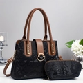 Borsa tote nera motivo serpente con manici marroni e pochette coordinata chic - Nero