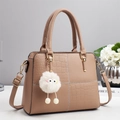 Brown PU handbag with crocodile texture, white contrast stitching and plush charm - Khaki
