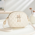 Quilted round shell shoulder bag in cream white with golden swan and pearl pendants - Off-white
