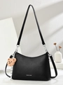 Black pebbled leather shoulder bag for women with plush bear charm and dual straps - Black
