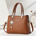 Brown faux leather tote bag with lychee texture and silver pendant in minimalist setting - Khaki/Earth Yellow