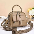 Khaki crossbody bag with textured leather and geometric wide strap on a stylish background - Khaki