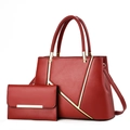 Dark red 2-piece tote and clutch set with gold V-shape metal trim on white background - Wine Red