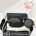 Close-up of black woven crossbody bag with geometric strap and round coin purse detail - Black