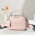 Pink lychee texture crossbody bag with embroidery and removable geometric strap - Pink