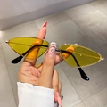 Detailed view of trendy triangular metal sunglasses with yellow transparent lenses - Gold Frame Yellow Lenses