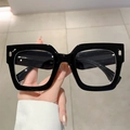 Montatura per occhiali quadrata nera oversize con rivetti in metallo argento sul lato - Nero