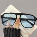 Square black frame sunglasses with light blue lenses for a stylish street photography look - Black Frame Blue Lens