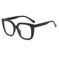 Detail shot of black thick-frame cat-eye glasses with reflective anti-blue light lenses - Black