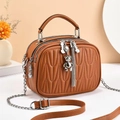 Brown quilted crossbody bag with triple zippers and a metal bear charm in retro style - Khaki/Earth Yellow