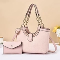 Pink snakeskin embossed tote bag and matching envelope wallet with gold chain straps - Pink