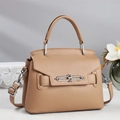 Elegant khaki mini pillow bag with silver turn-lock and premium pebble leather texture - Khaki